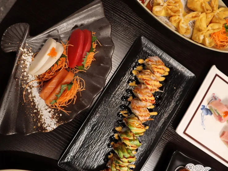 Specialty maki rolls and sashimi from the Yummy Bowl menu